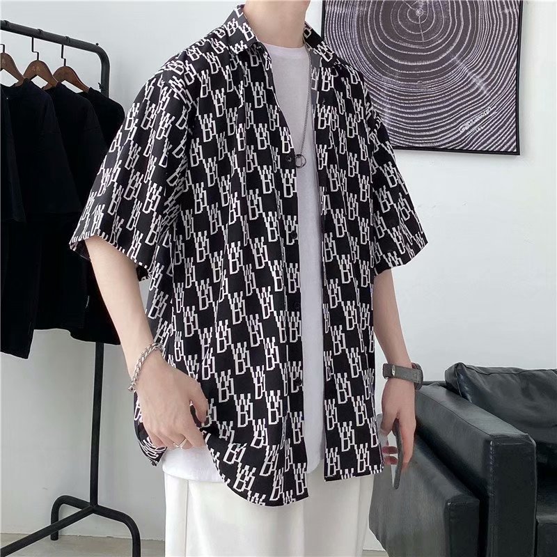 Hong Kong estilo Retro Vintage floral camisa manga corta Estilo Hawaiano tailandés diseño Ruan guapo camisa suelta para hombres y mujeres