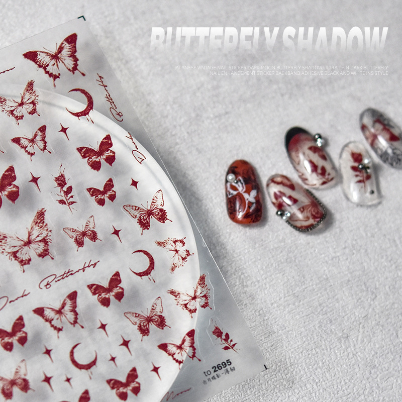 Etiqueta de uñas papel neto rojo caliente blanco y negro mariposa líquido hueco alivio etiqueta oscuro hueco uñas calcomanías Decoración