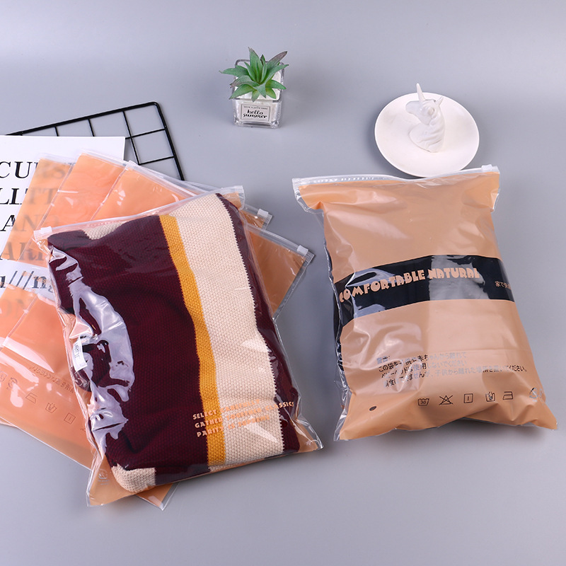 Bolsa con cremallera de ropa Bolsa con cremallera de crisantemo pequeño Bolsa de embalaje de camiseta Bolsa de ropa interior Bolsa de ropa PE esmerilada pequeña bolsa ziplock