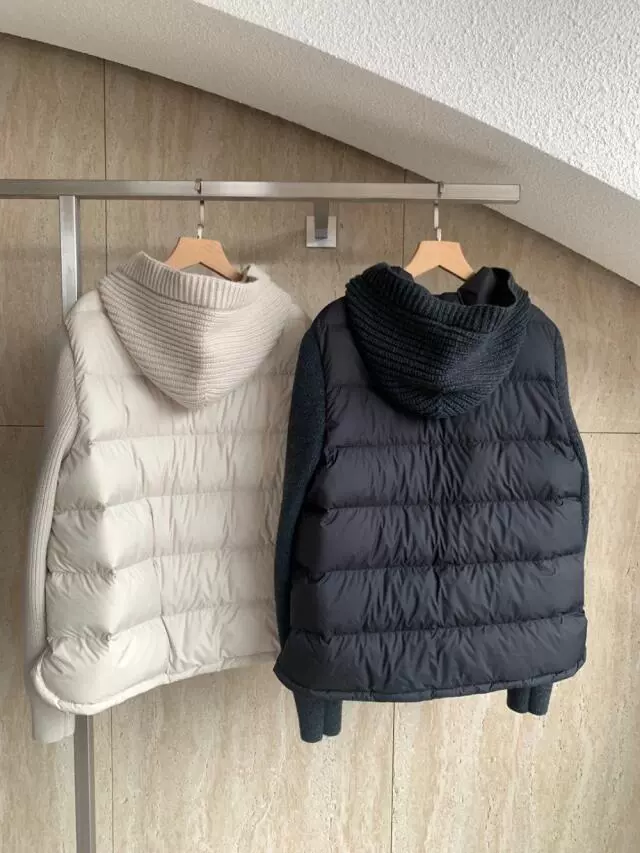 Winter knitted black down jacket with hood for leisure