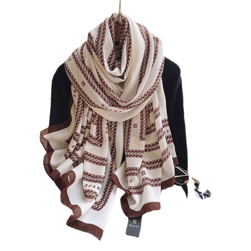Corea Dongdaemun estilo caliente bufanda de algodón y lino para mujer otoño e invierno nuevo estilo todo fósforo cálido moda alfabeto bufanda decoración chal