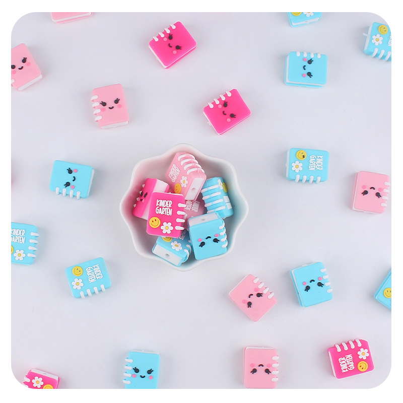 Bebés y niños pequeños dibujos animados silicona cuaderno dentín bebé creativo DIY pacificante chaqueta pulsera accesorios juguetes