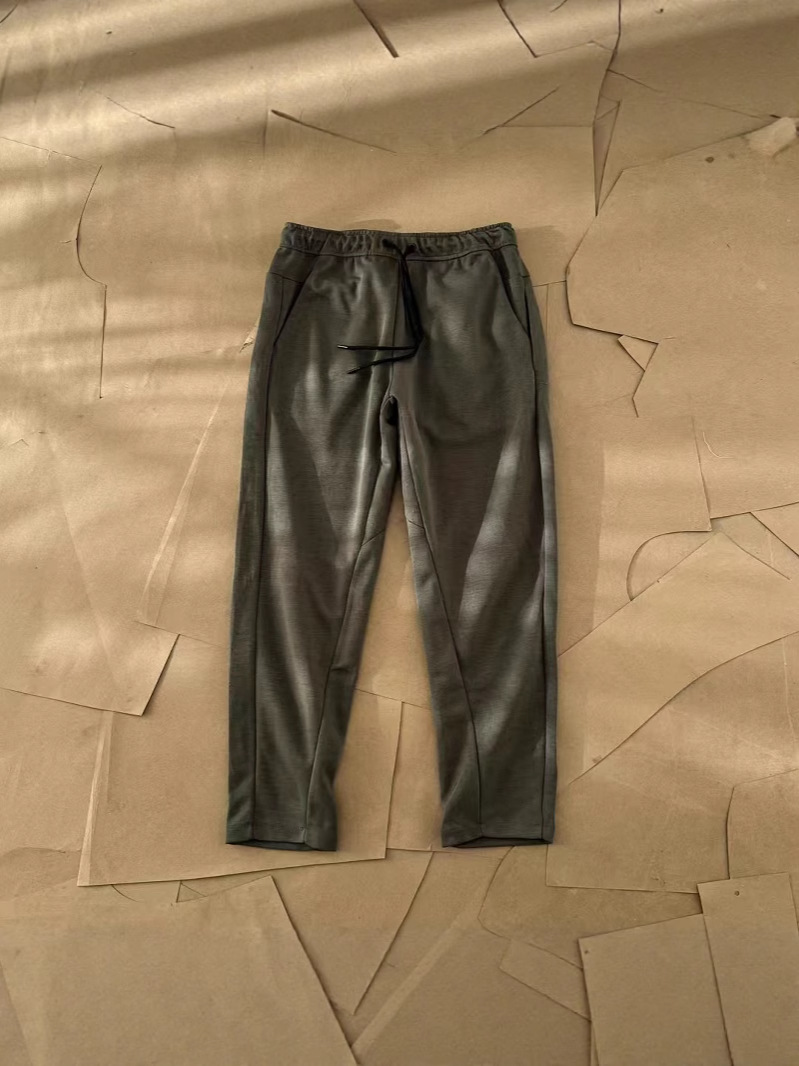 Nuevo hombre deportivo ocio al aire libre versátil punto suelto pantalones largos de piernas largas pantalones 211