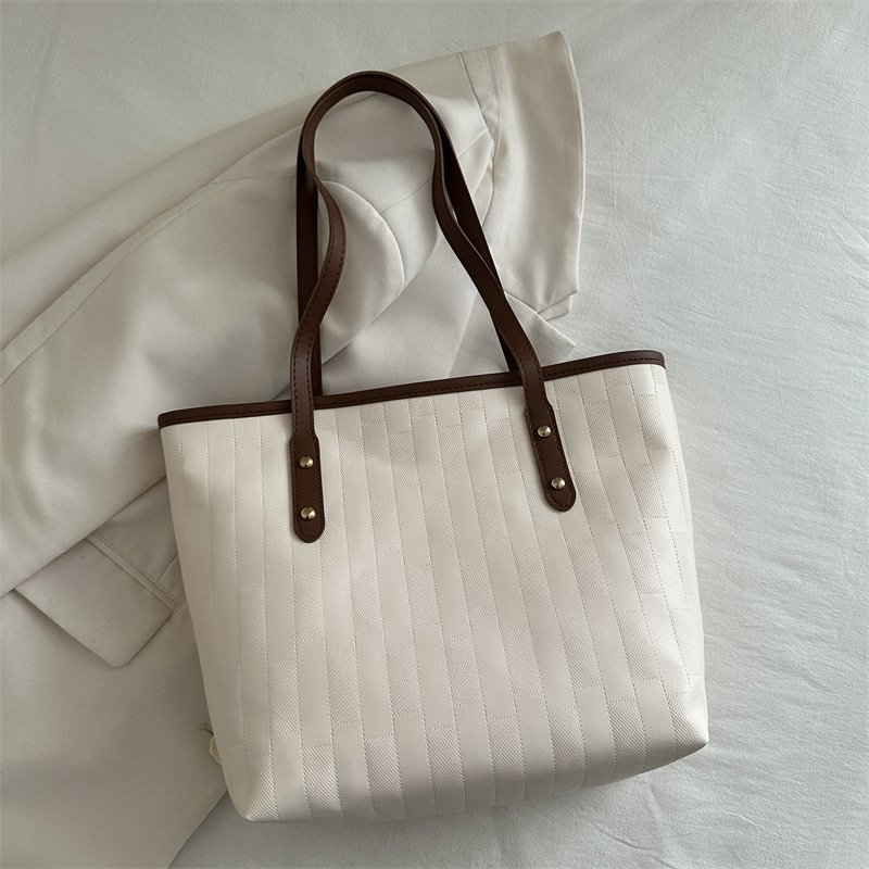 Personalidad de la bolsa de gran capacidad para mujeres invierno 2024 nueva moda mochila casual textura clase de viaje bolsa