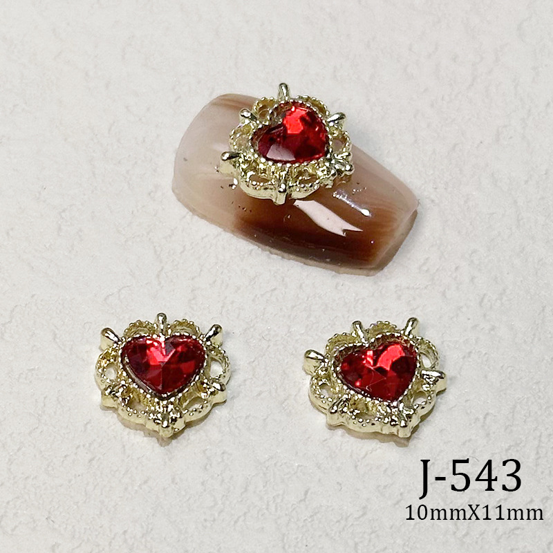 2023 Nueva joyería de uñas Año nuevo rojo aleación conejo rojo mariposa de cristal pintura en aerosol arco accesorios de diamantes de uñas