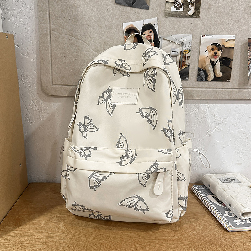 Mochila japonesa de nicho mariposa para mujeres, mochila de clase para estudiantes, mochila de viaje de ocio de gran capacidad para mujeres
