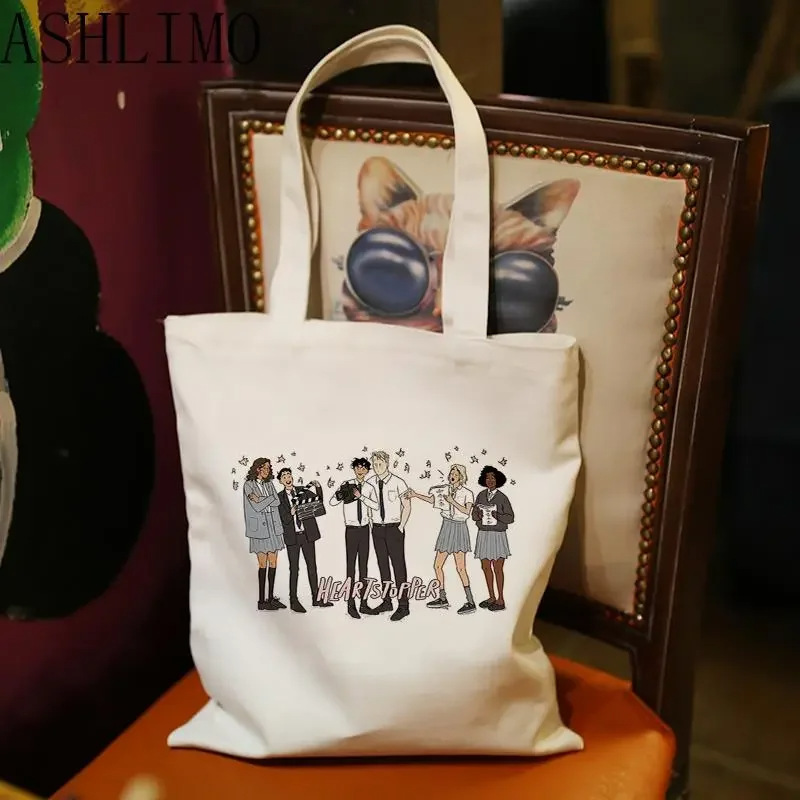 韩式潮流卡通情侣人物帆布包可折叠大容量购物袋棉质环保腋下包