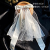 White hairgrip with bow suitable for photo sessions for bride, hair accessory