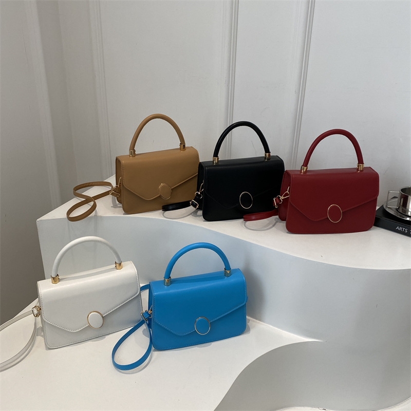 2025 primavera nuevo estilo simple y popular bolso de hombro coreano de color sólido simple bolso de literatura y arte para mujeres