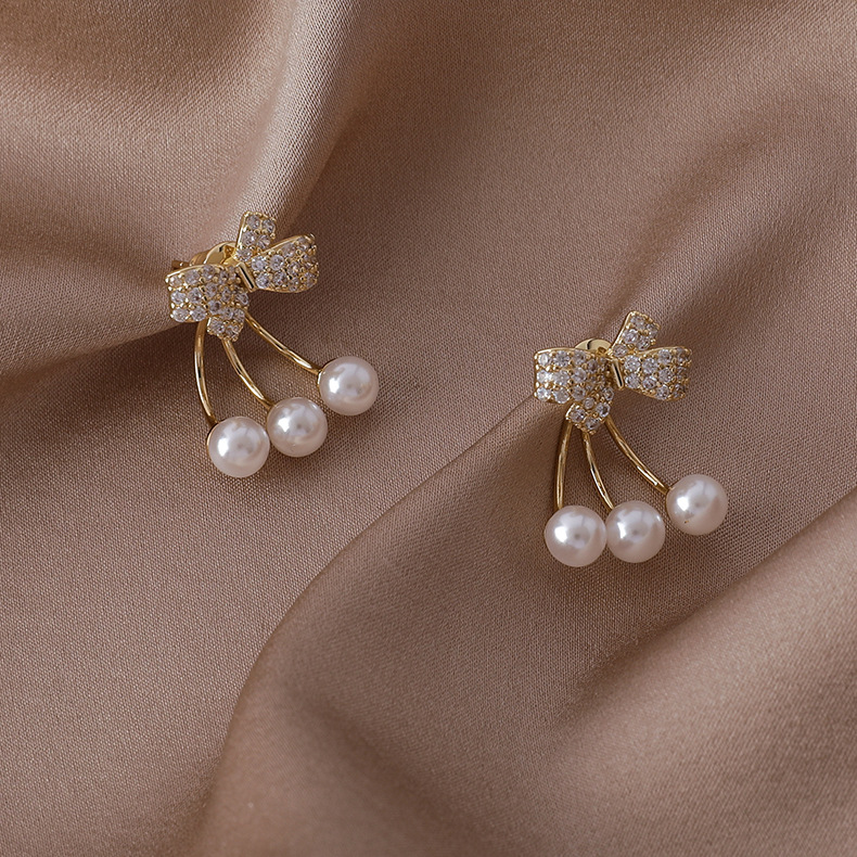 الجملة بسيطة مايكرو مطعمة الزركون Bowknot اللؤلؤ النحاس أقراط Nihaojewelry display picture 2