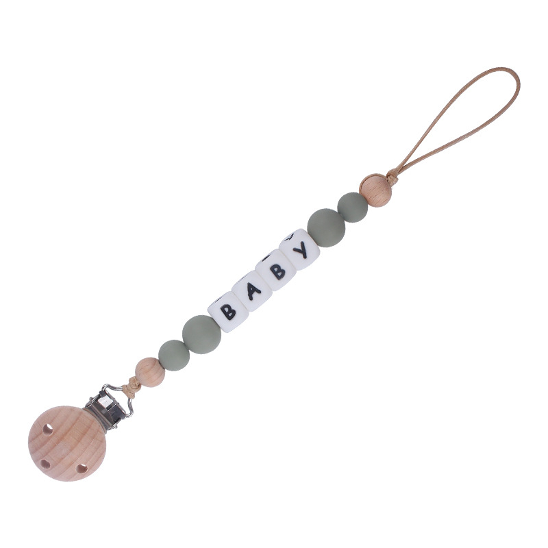 Nuevos suministros para bebés Haya agujero redondo clip bebé creativo DIY chupete Cadena de silicona mordedura de juguete cadena anti-caída
