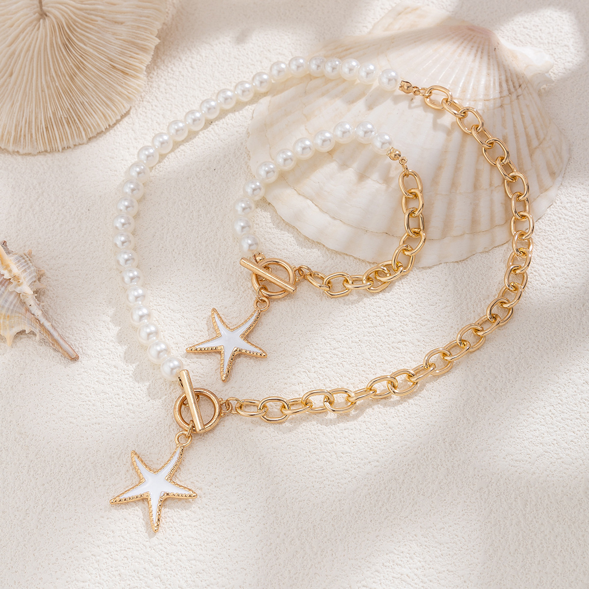 Set gioielli donna collana croce stella e perle sintetiche_voghion.com