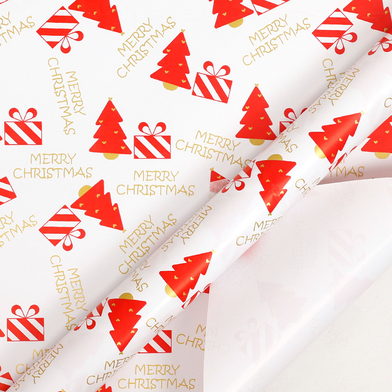 Papel de regalo navideño clásico y popular de gran tamaño con diseño de dibujos animados y temática navideña para envolver regalos.