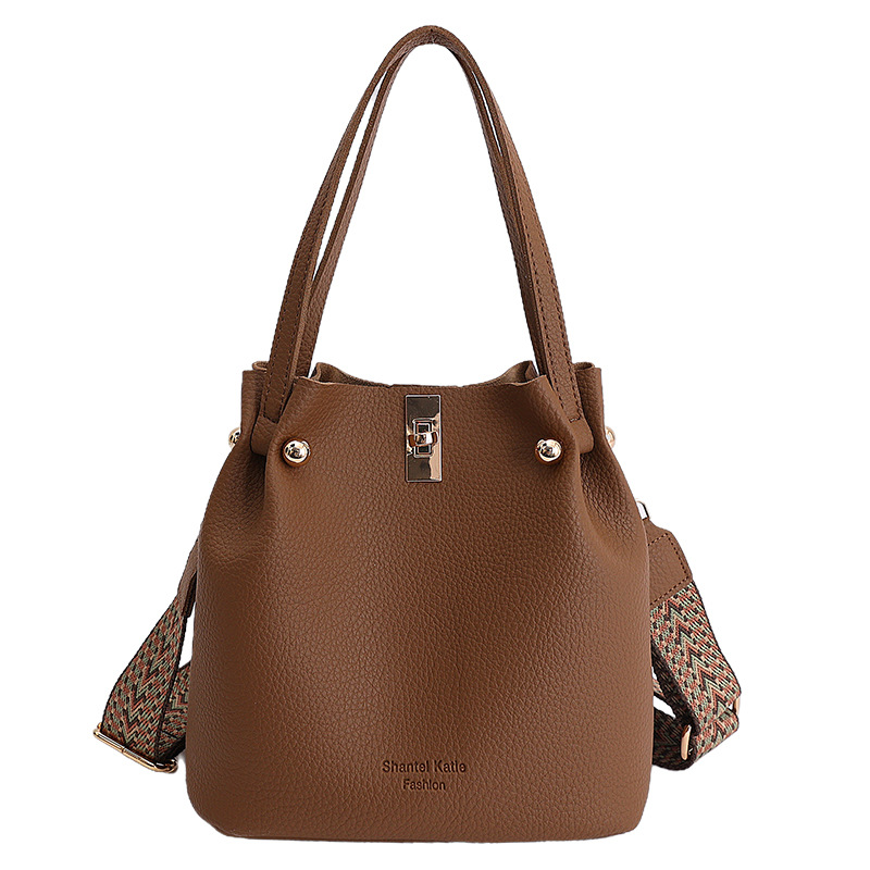 Bolso de cubo de mano de gran capacidad de mujeres venta caliente transfronteriza nuevo lichi bloqueo plegable moda casual bolso de mochila