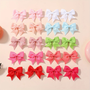 Juego de horquillas con lazo de cola de milano para niños de estilo caliente de Amazon, lindo y versátil, horquilla diaria para niñas europeas y americanas 323