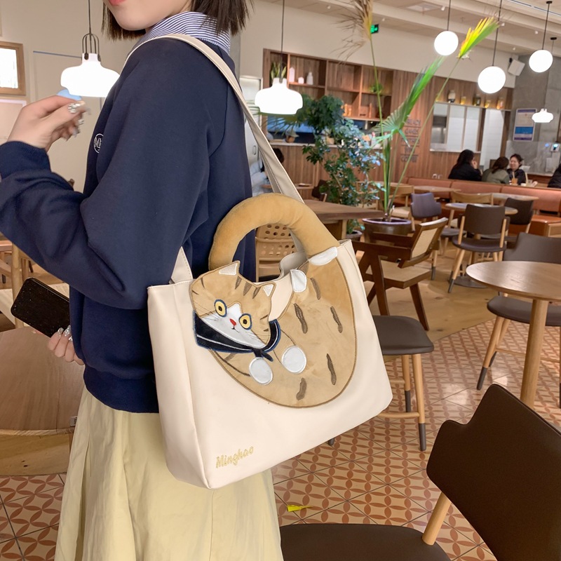Large capacity cat for women 2024 new ins versatile cartoon shoulder student class tote bag_voghion.com