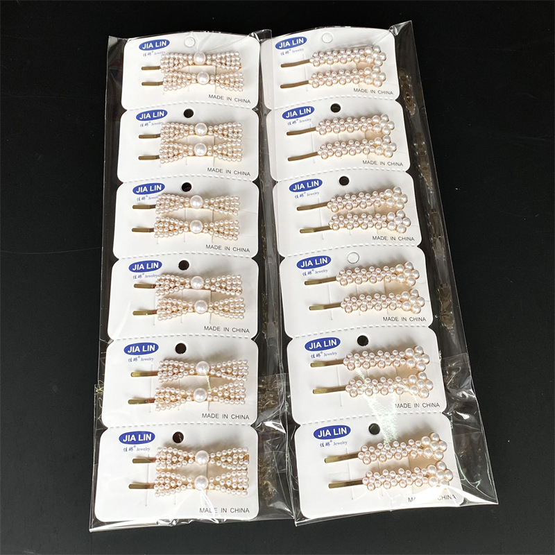 Venta caliente de aleación de oro de diamante incrustado horquilla de pico de pato clip de presión clip de dos yuanes tienda de accesorios para el cabello accesorios para la cabeza puesto de suministro