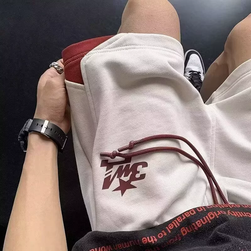 Американские повседневные шорты и спортивные штаны для мужчин 2025, новые летние тонкие уличные модные брендовые свободные брюки с пятью точками