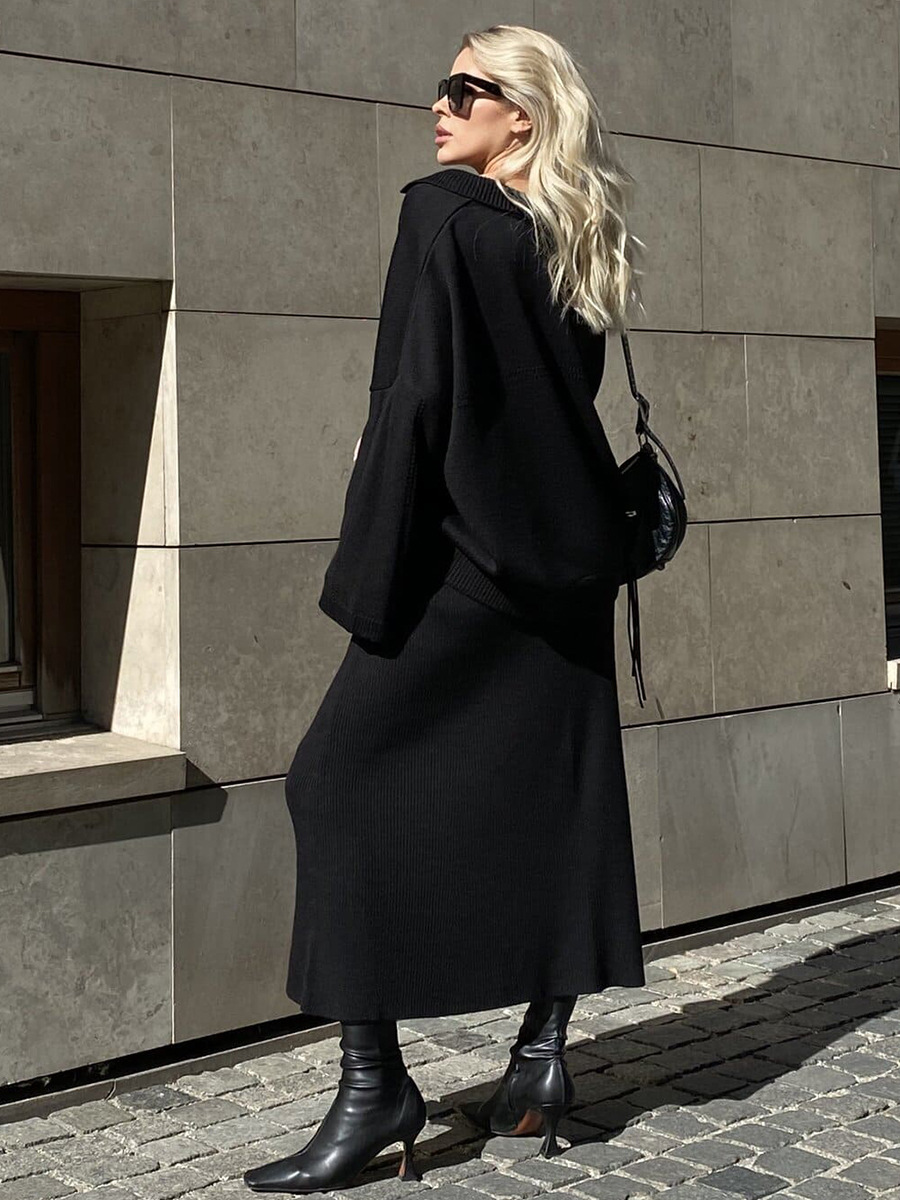 Conjunto de punto transfronterizo Europa y los Estados Unidos 2025 invierno nuevo estilo de moda minimalista viento suéter de punto de cuello V conjunto de falda de busto