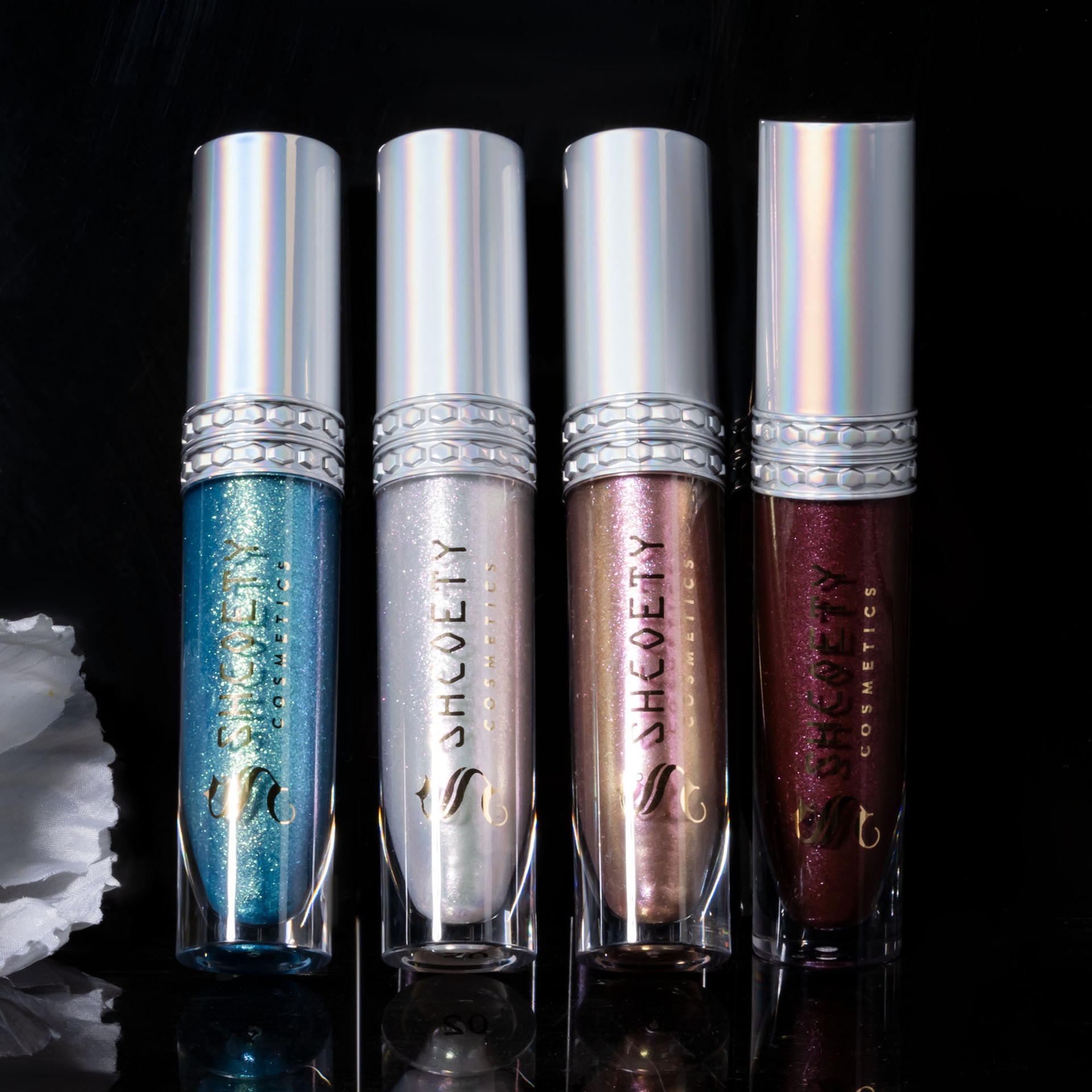 SHCOETY Cross-border Sparkling Polarized Lip Gloss is long-lasting and easy to color, with a dazzling bright lip gloss and a fine pearlescent glow that moisturizes the lips undefined