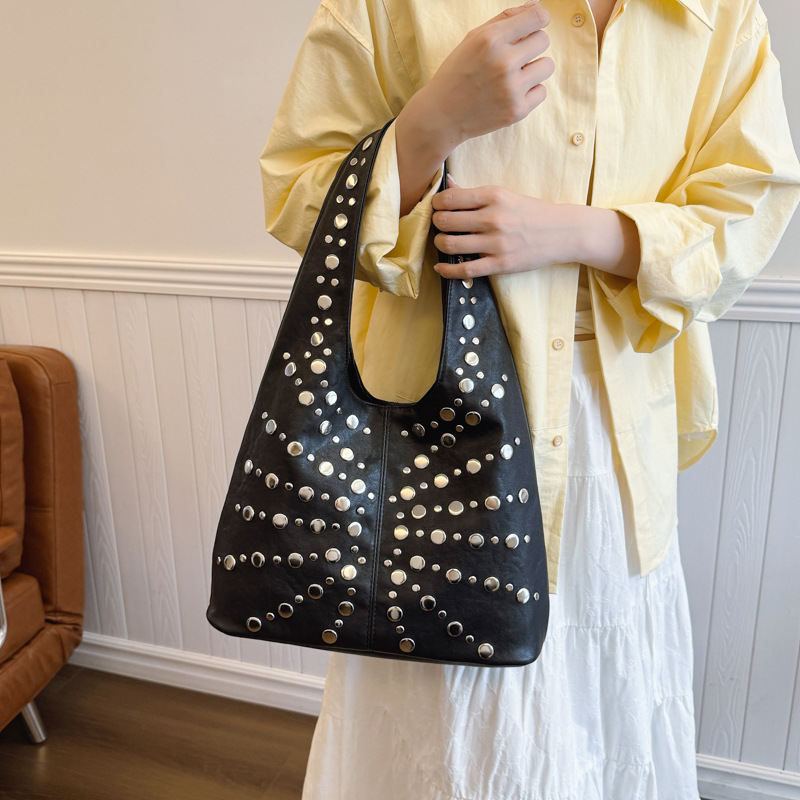 Bolso de textura transfronteriza 2025 verano nuevo estilo bolso retro remache bandolera bolso de mensajero de gran capacidad mujer