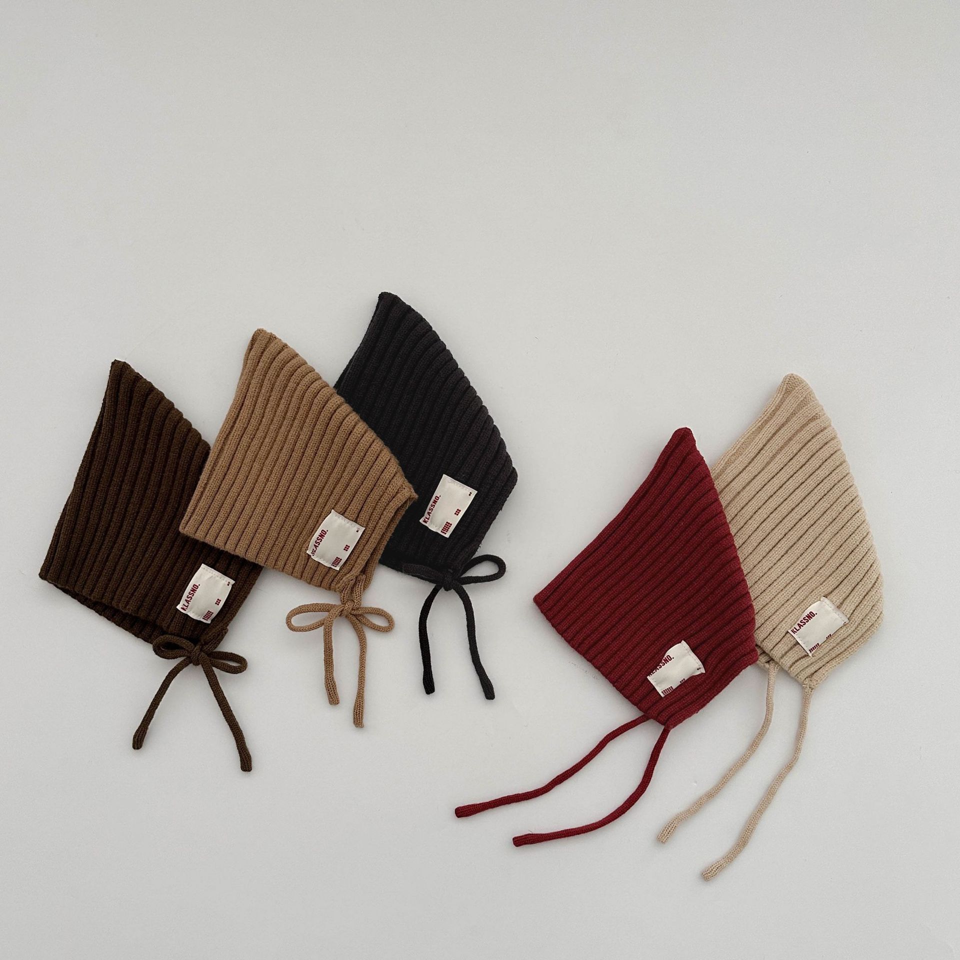 ins sombrero para bebés coreanos otoño y invierno caliente a prueba de viento gorra de punto para niños y niñas recién nacidos correa gorra de bolso