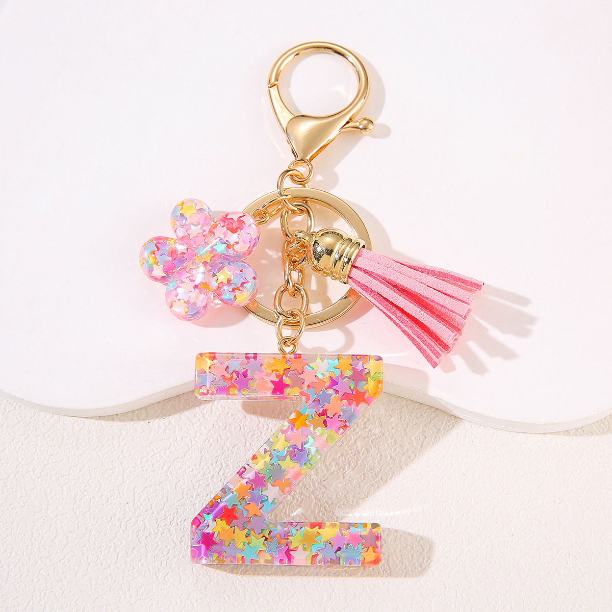 Un nuevo llavero flor de goteo de goma esquinilla 26 letras bolsos colgante llavero accesorios Yiwu