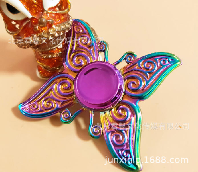 B Dedos de araña de colores, peonza, yema del dedo de metal de tres hojas, peonza de dos hojas, productos pequeños, suministro al por mayor