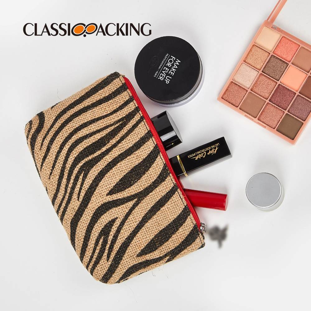 Bolsa de cosméticos al por mayor de fábrica Bolsa de almacenamiento de patrón animal popular transfronterizo Bolsa de embrague de material tejido con logotipo