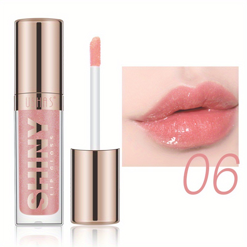 USHAS Europa y América Esmalte de labios de punto transfronterizo Lápiz labial Taza antiadherente Brillo de labios impermeable sin decoloración LG2494A
