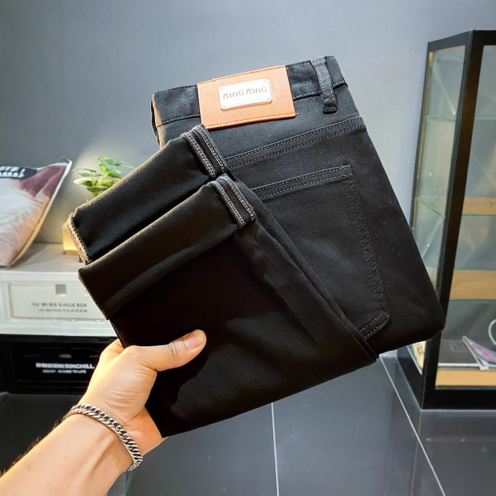 High-end Lesel verano delgado puro negro jeans hombre delgado pie pequeño pantalones americanos de calzado de calzado