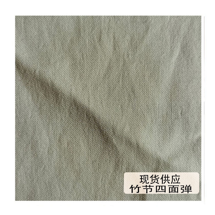 现货供应涤棉有光斜纬弹四面弹面临春秋时装裤装布料批发
