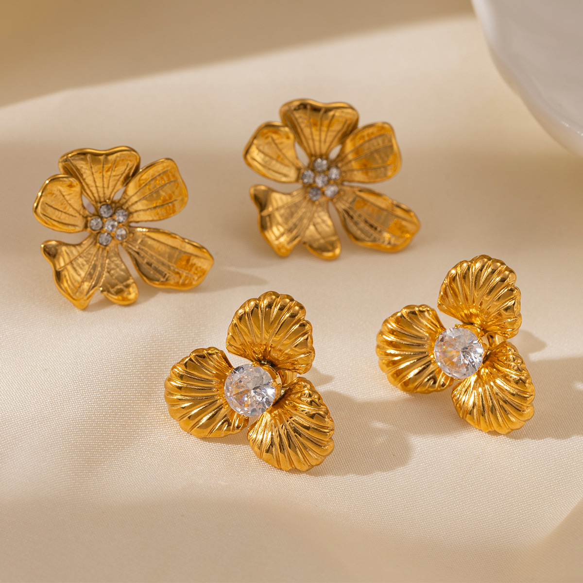 Taina europa y americana pendientes de acero inoxidable lujo ligero de lujo de alto nivel transfronterizo joyas de venta caliente de moda personalidad joyas de orejas de acero de titanio