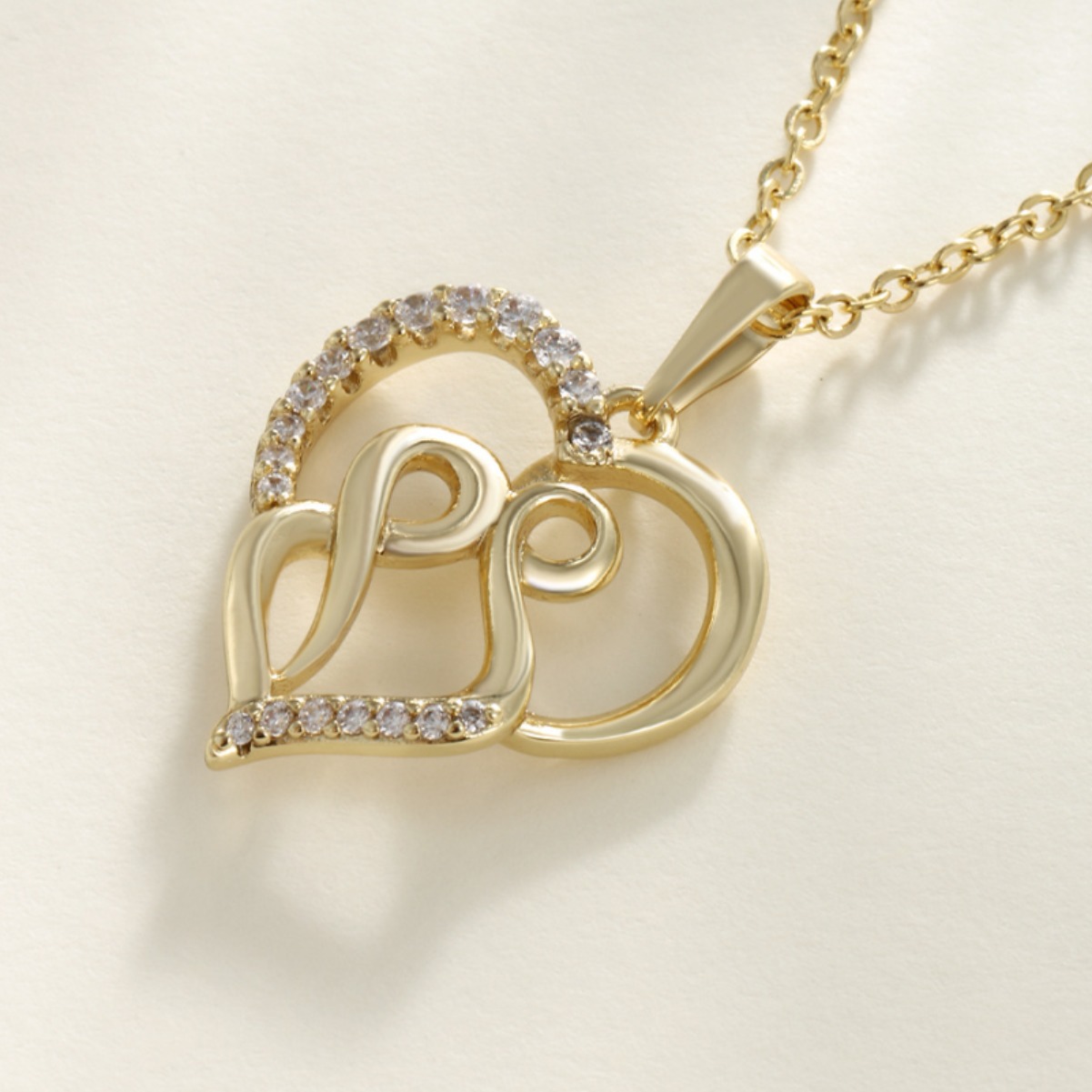 Xuping aleación de cobre chapado en oro hueco colgante de corazón de verano de alta calidad transfronteriza nuevo amor colgante de zircon collar