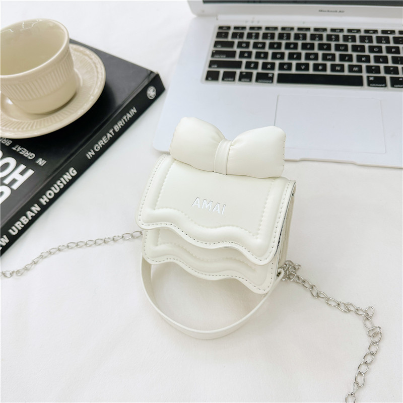 Primavera nuevo estilo coreano mini bolso de hombro de los niños pu arco cadena mensajero bolsa de hombro de las niñas bolsa padre-niño bolsa
