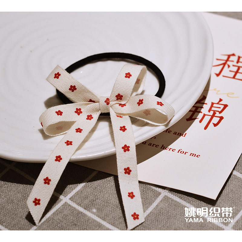 Logotipo de cinta impresa personalizada letras inglesas patrón de ayuda cinta de tejido flor caja de regalo embalaje personalizado cinta