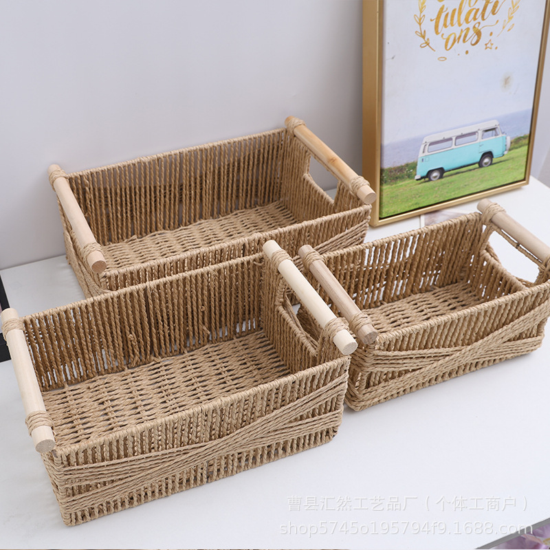 Cesta de almacenamiento de mesa tejida para el hogar al por mayor de comercio exterior con manija de madera
