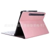 Golden white case contains rose, keyboard
