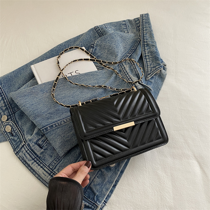Este año, la nueva tendencia de alta calidad de la cadena de diamante, bolsos cuadrados, bolsos de moda de hombro simple, bolsos de mujer.
