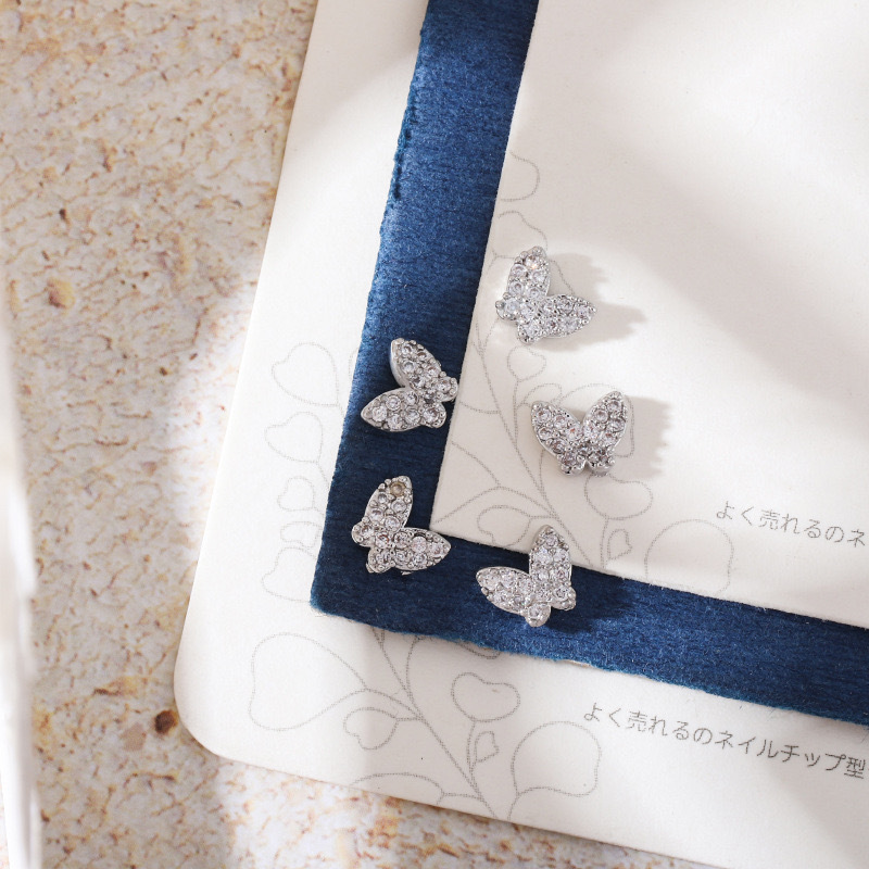 Celebridad de Internet nuevos accesorios de uñas Iris arco de alta retención de color ajuste arco de uñas diamante desgaste material de uñas diamante