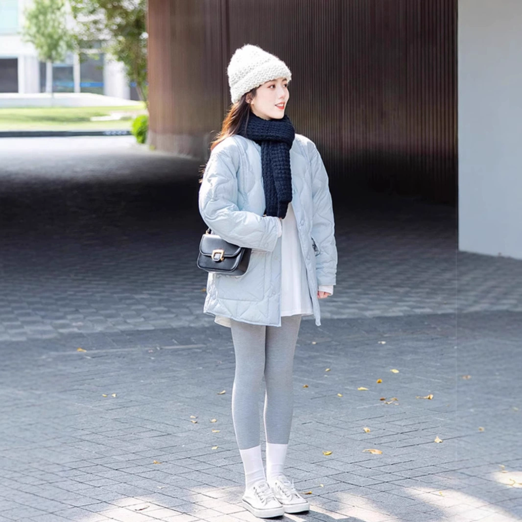 Blue down jacket with diamond pattern with a round collar, Chanel style