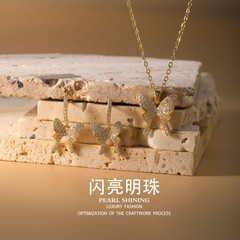 光沢のある真珠の銅のイヤリングとネックレスセット蝶色褪せない女性の軽い高級ハイエンドの国境を越えた卸売ジュエリー