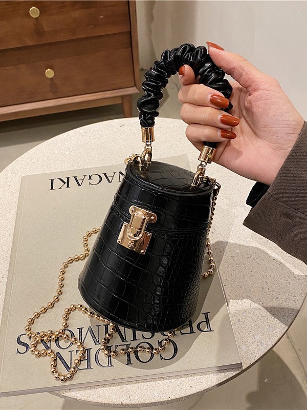 Bolso de mujer transfronterizo 2025 nuevo cocodrilo bolso de cubo bolso de hombro de cadena de moda europea y americana bolso de mano popular en línea