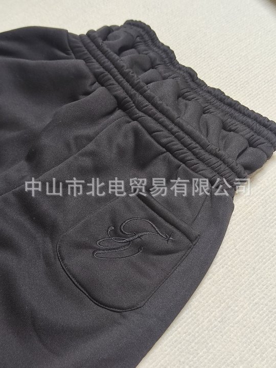 2025 nuevo otoño y invierno pesado estilo europeo y americano doble cintura cabeza de moda para hombres y mujeres pantalones de correa sueltos bordados pantalones al por mayor image 7