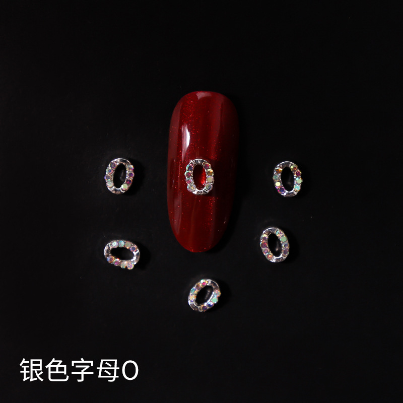 Nueva LZ manicura 26 letras aleación joyería estilo japonés Internet celebridad plata letras manicura joyería clavo Taladro