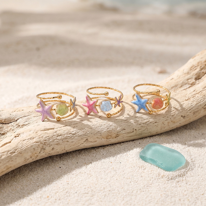 Tina Europa y los Estados Unidos color transfronterizo goteo estrella de mar anillo de nicho de diseño de vacaciones marinas joyas al por mayor mujeres