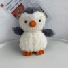 Curly penguin 18cm