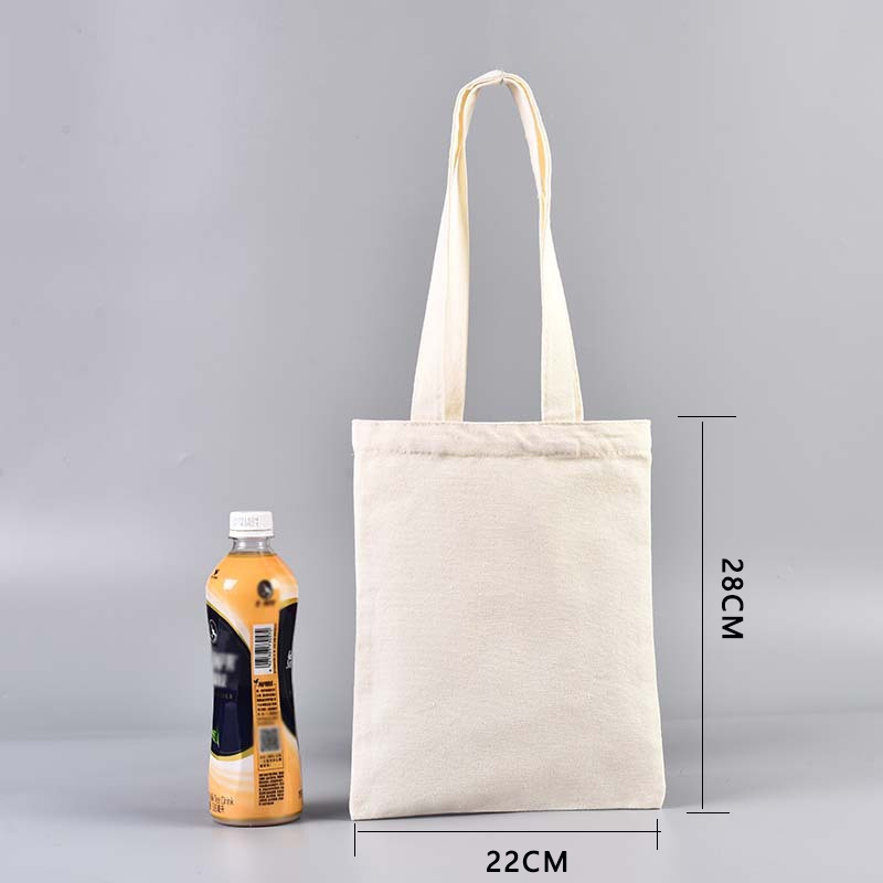 En stock bolsa de lona portátil en blanco personalizable logotipo de impresión en color de un solo hombro bolsa de compras bolsa de algodón de entrenamiento publicitario