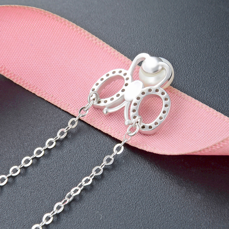 Coreano pequeño lindo joyas de plata frescas y de moda S925 plata esterlina micro-martillo collar de mariposa de piedra cadena clavícula al por mayor