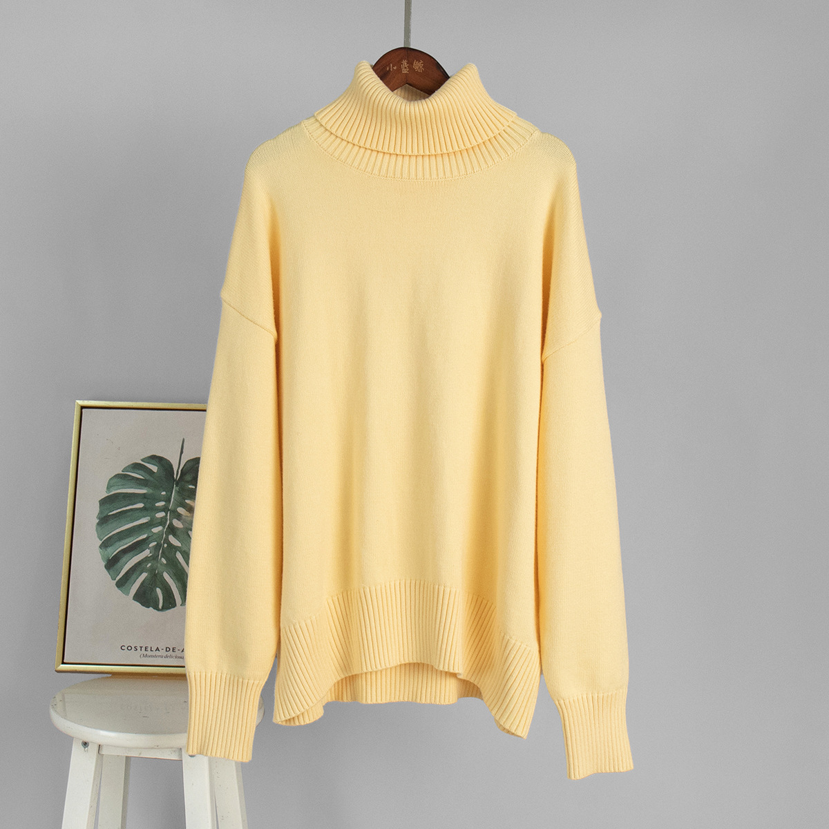 Suéter de cuello alto de Amazon transfronterizo para mujer 2025 Suéter suelto de otoño e invierno europeo y americano Suéter clásico de color sólido de todo fósforo